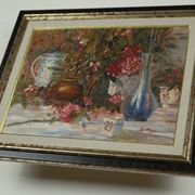 Still life with pink flowers and blue pots.