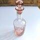 Vintage pink glass bottle