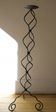 candlestick on wrought iron feet