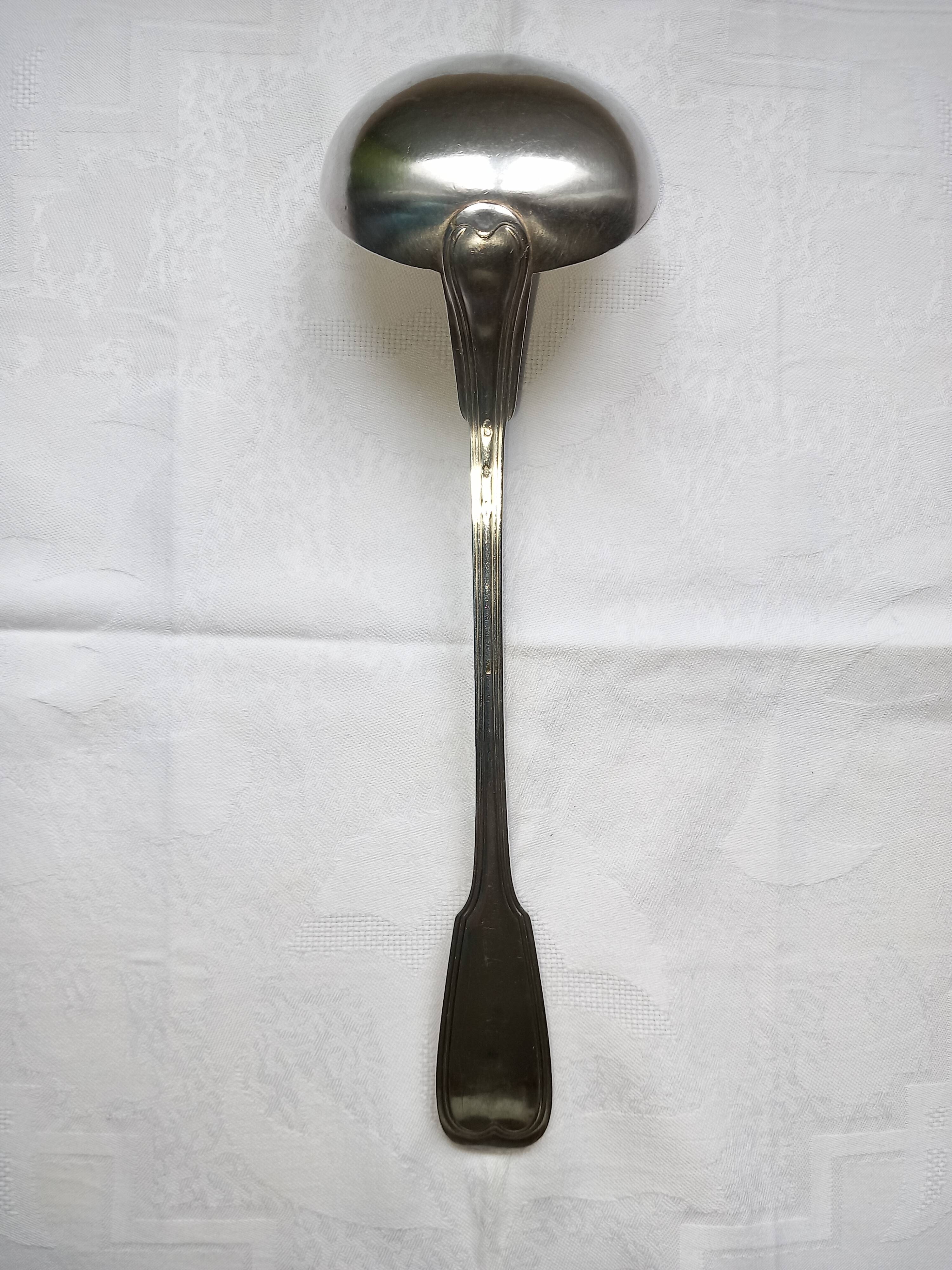 Silver metal ladle