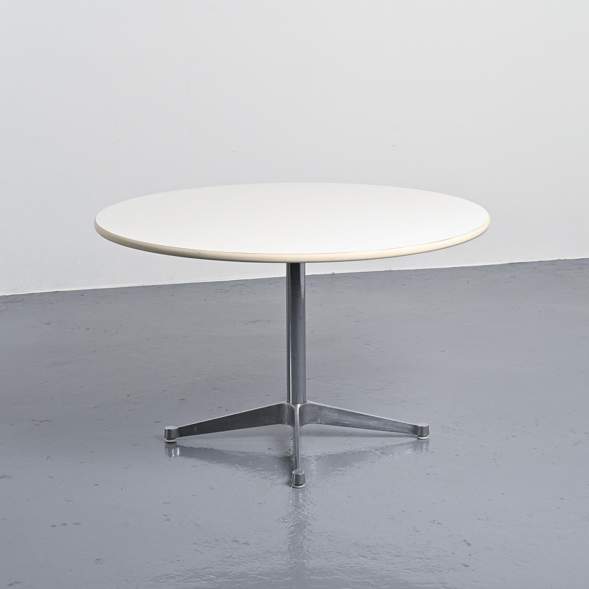 Round table by Charles and Ray Eames for Herman Miller, circa 1970.