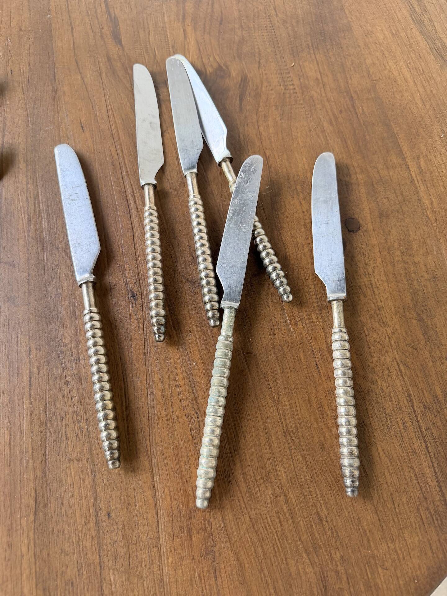 Set of silver-plated graphic cutlery for 6 people.