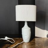 White ceramic table lamp with half lampshade