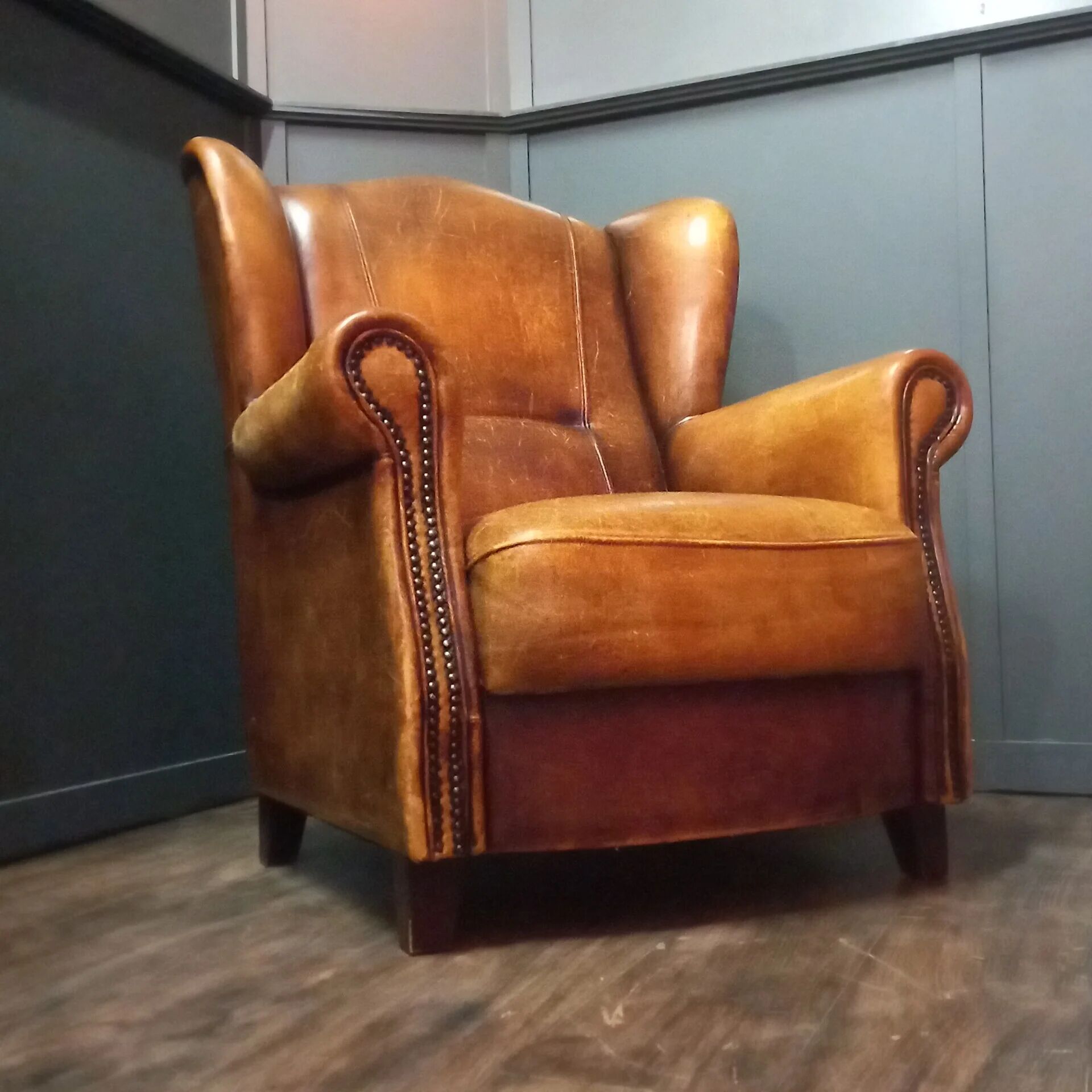 Robust vintage sheepskin armchair