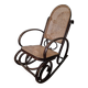 Curved wooden rocking chair with caning