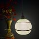 Vintage globe pendant light in green and gold granite glass