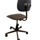 Brown vintage office chair from the 70s on wheels.