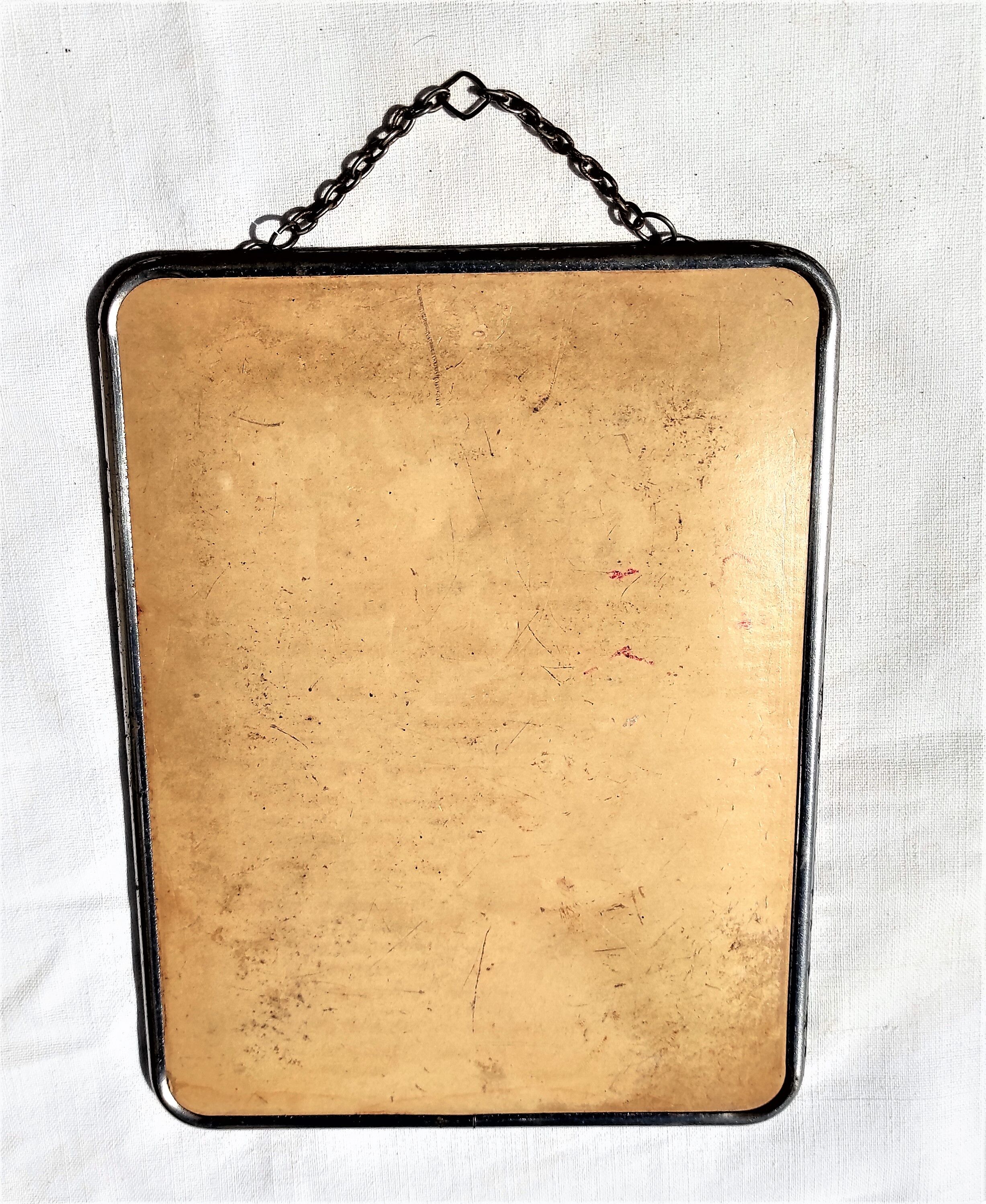 Barbier mirror with its chain around the 1950s vintage