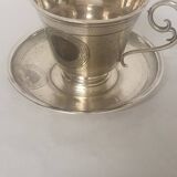 cups and saucers in solid silver