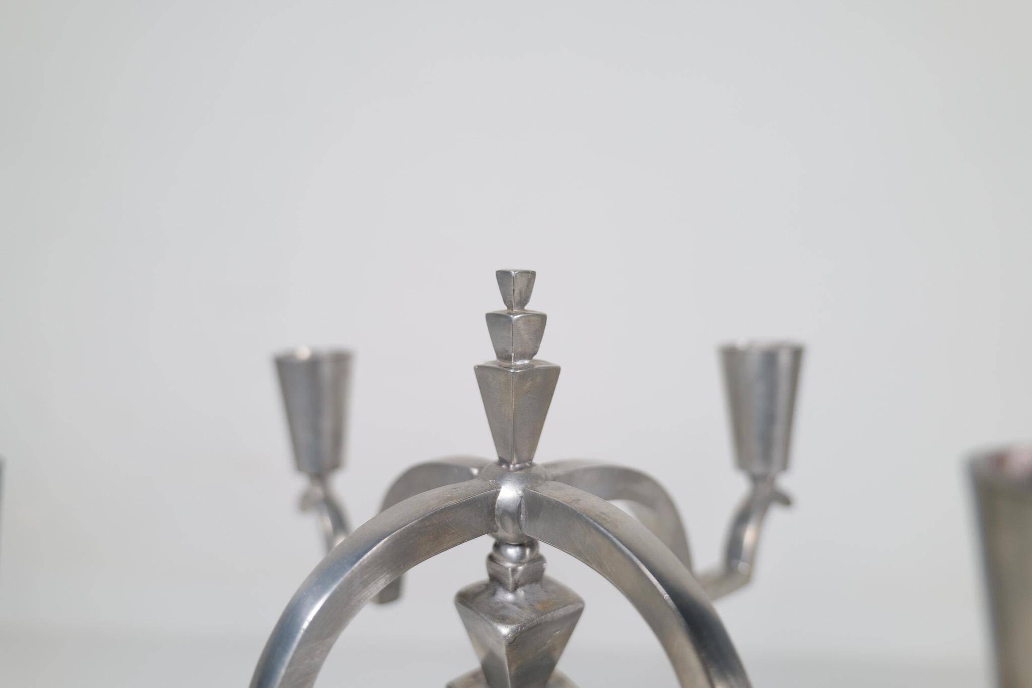 Sculptural Art Deco set of chandeliers in tin, Sweden, 1940s.