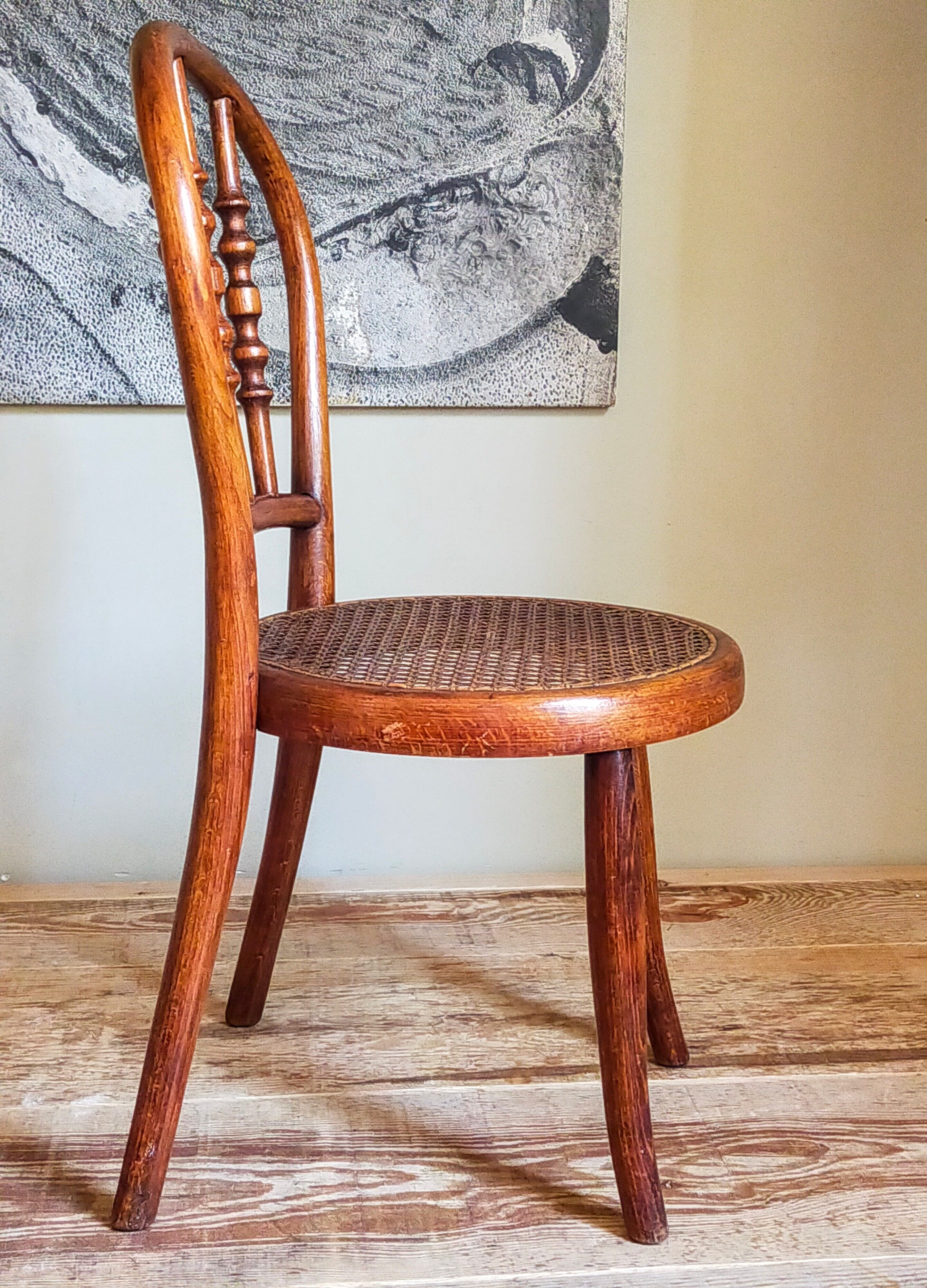 Children's chair in curved round wood old year