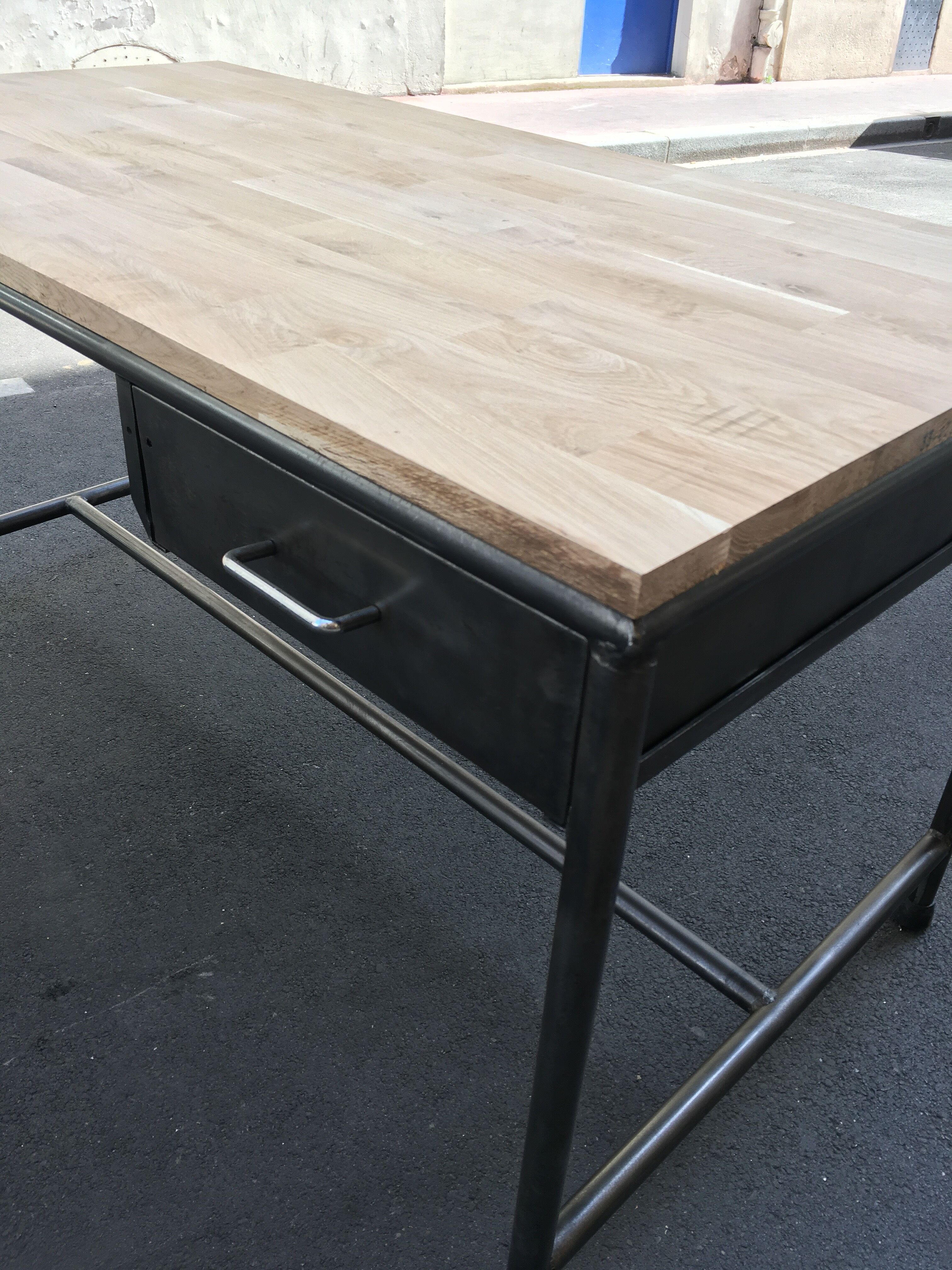 Metal desk on wood circa 1950