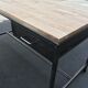 Metal desk on wood circa 1950