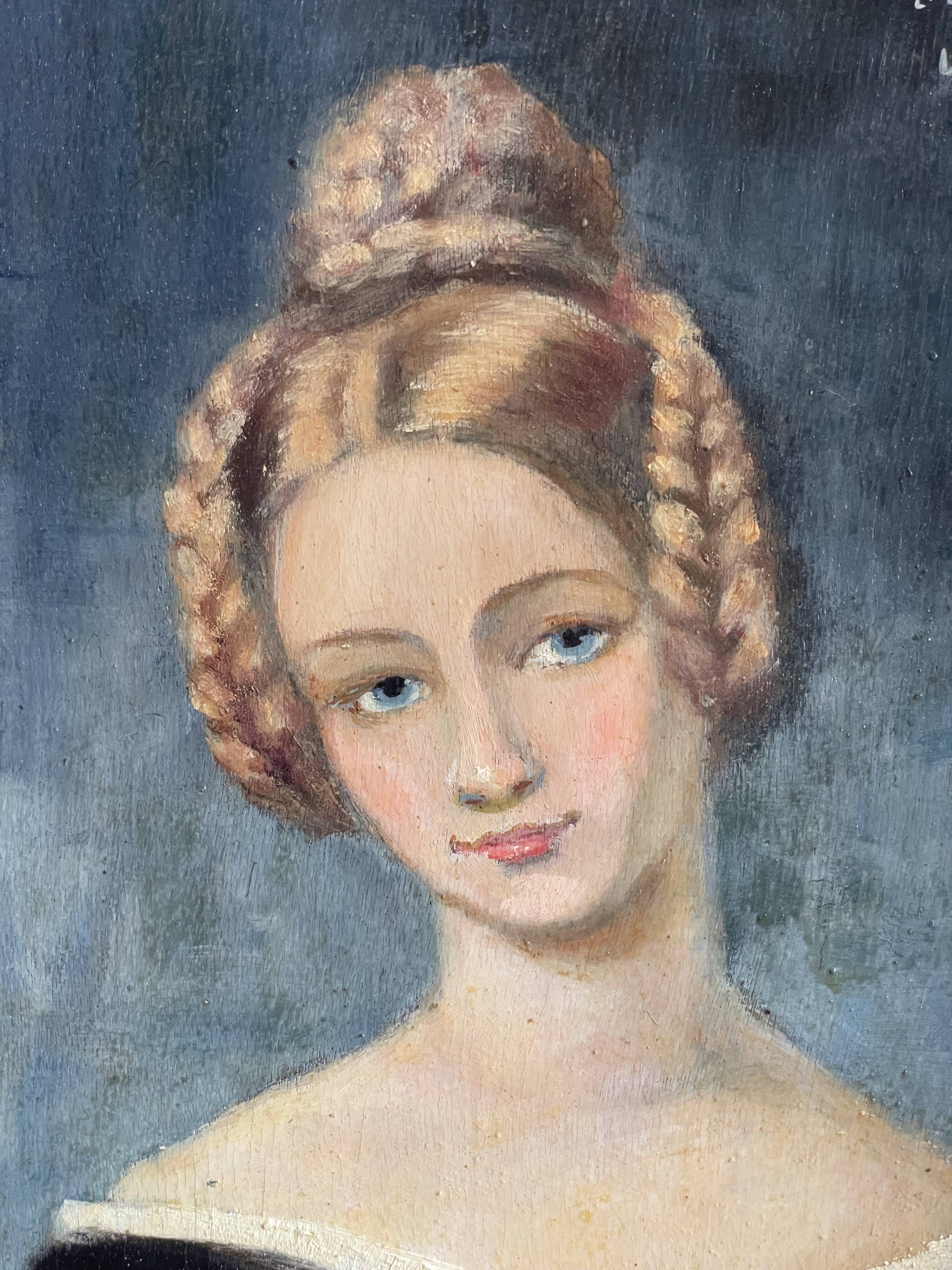 Portrait of young woman painting on wood