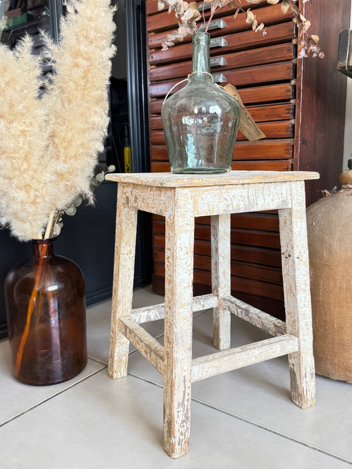 Old wooden stool with square seat