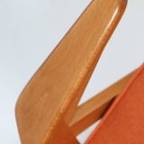 Fauteuil scandinave orange brûlée conclu par Chierowski