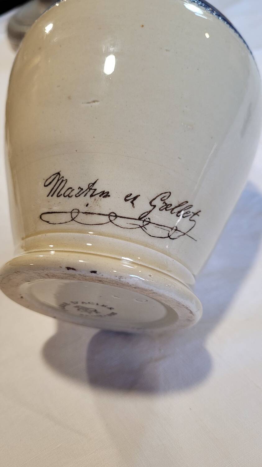 Antique iron-rich earth bottle from Saint Uze, ceramic carafe jug.