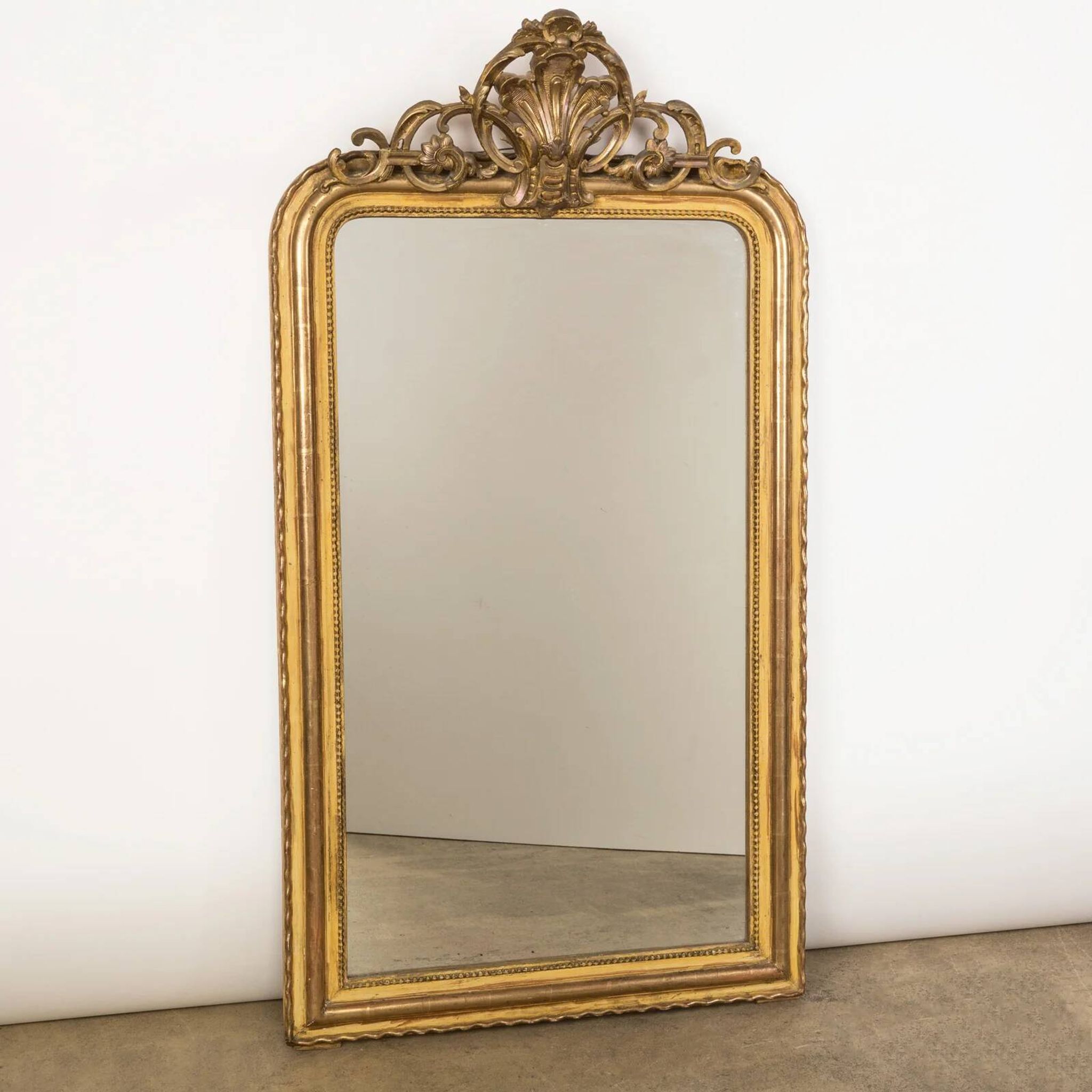 19th C antique yellow gold antique mirror with crest