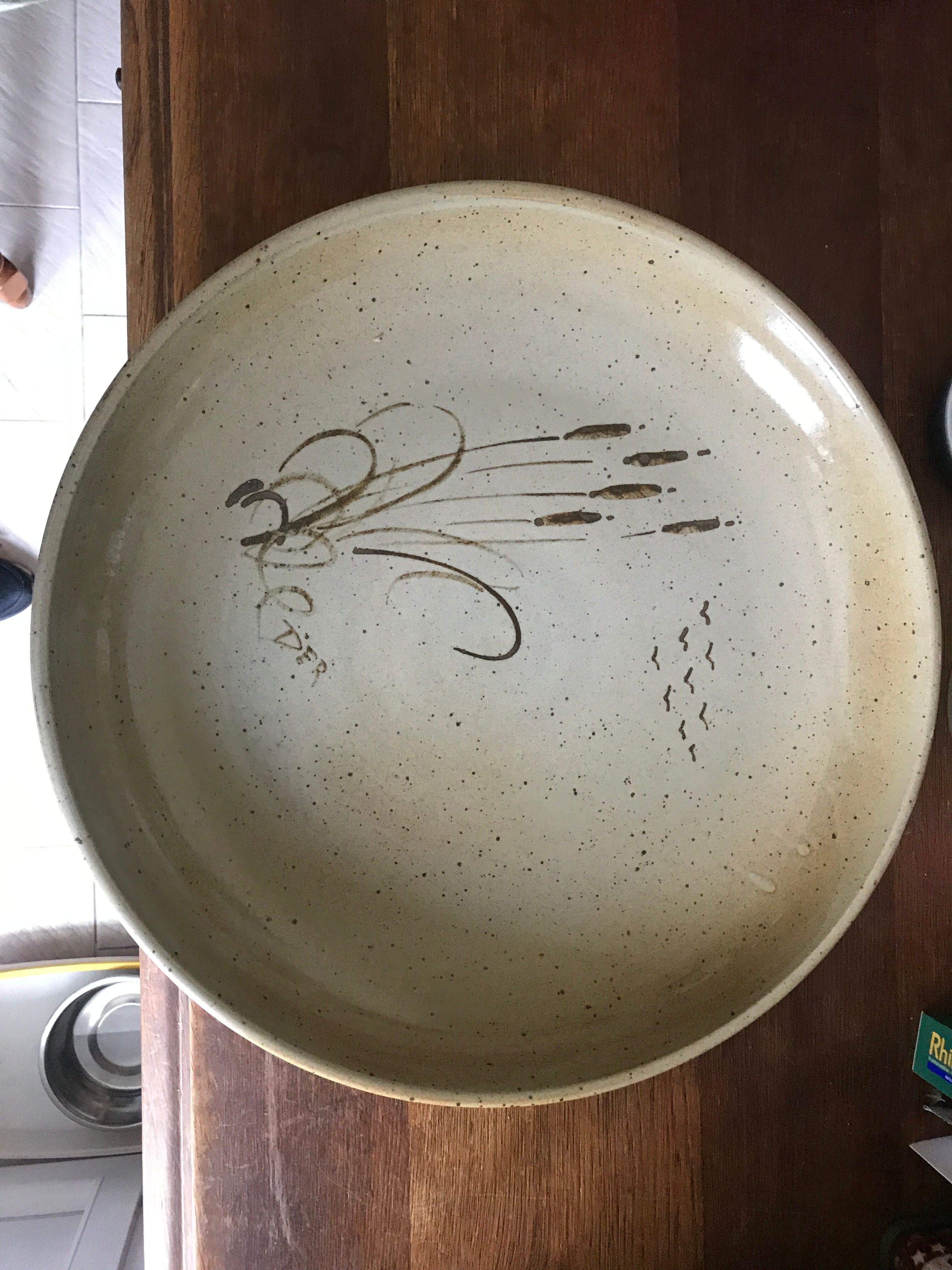 Large sandstone dish sign