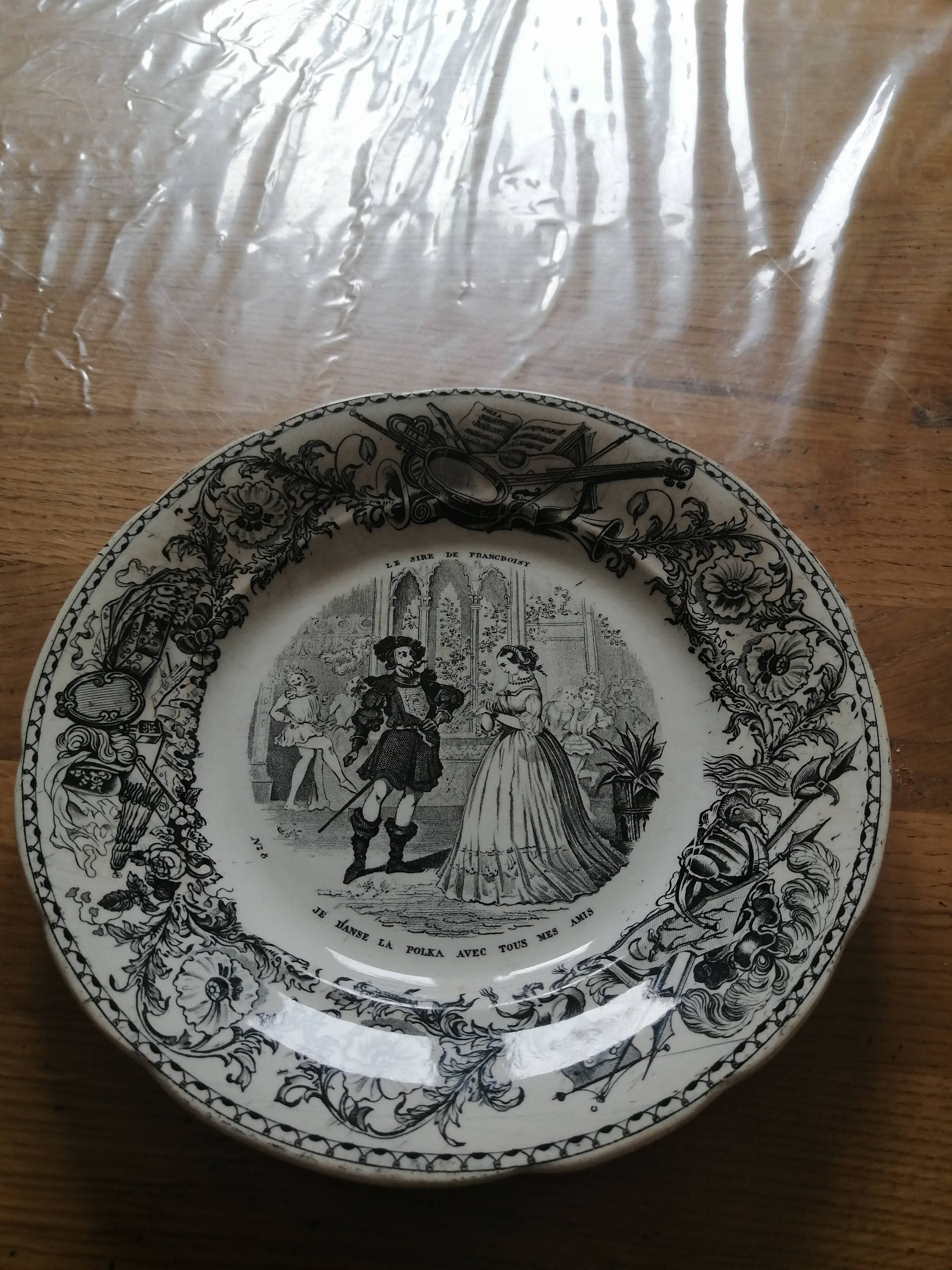 Set of eight talking plates
