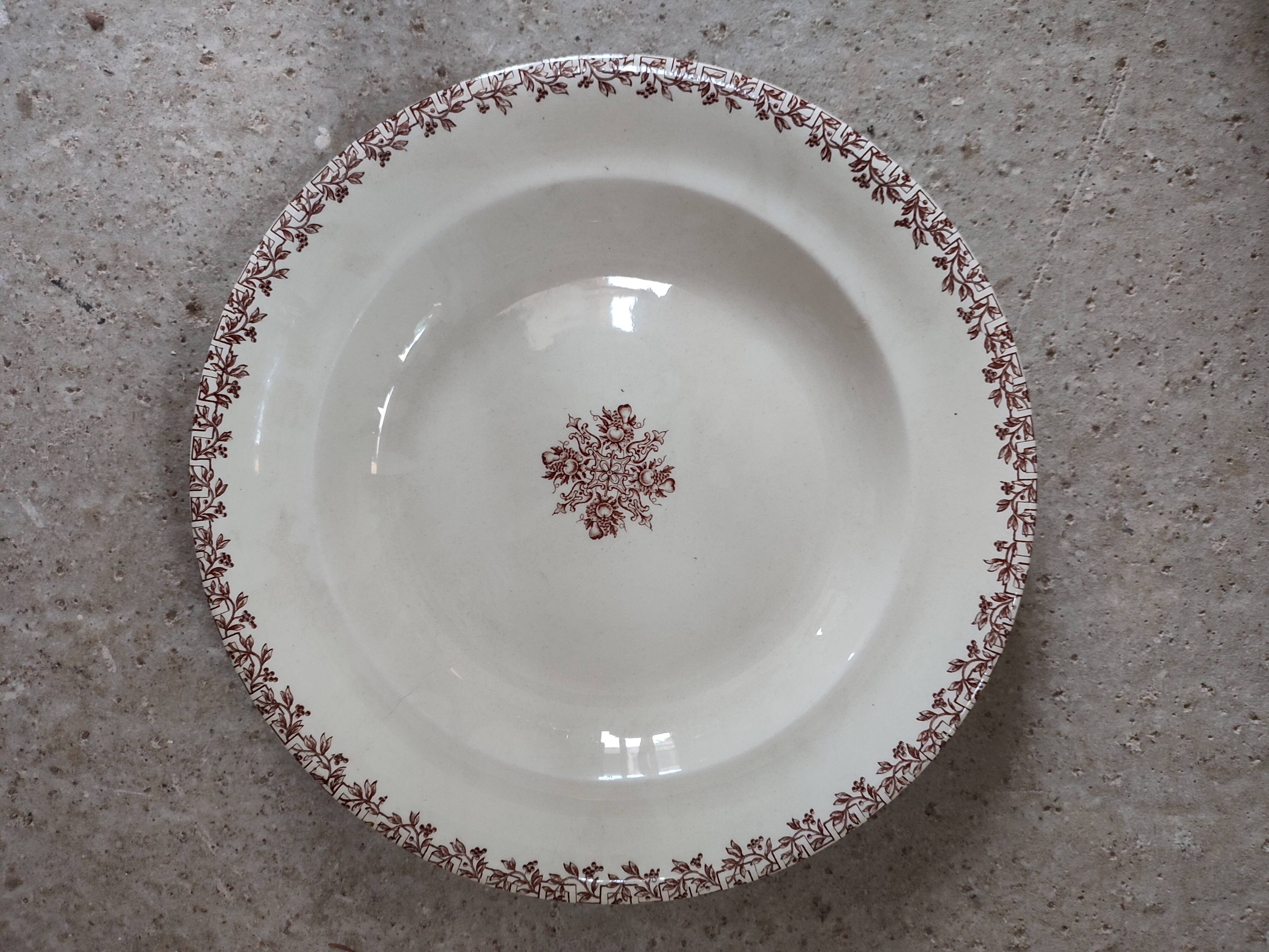 Old iron earth serving dish