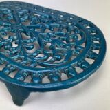 Dessous de plat ajouré en fonte bleu émaillé