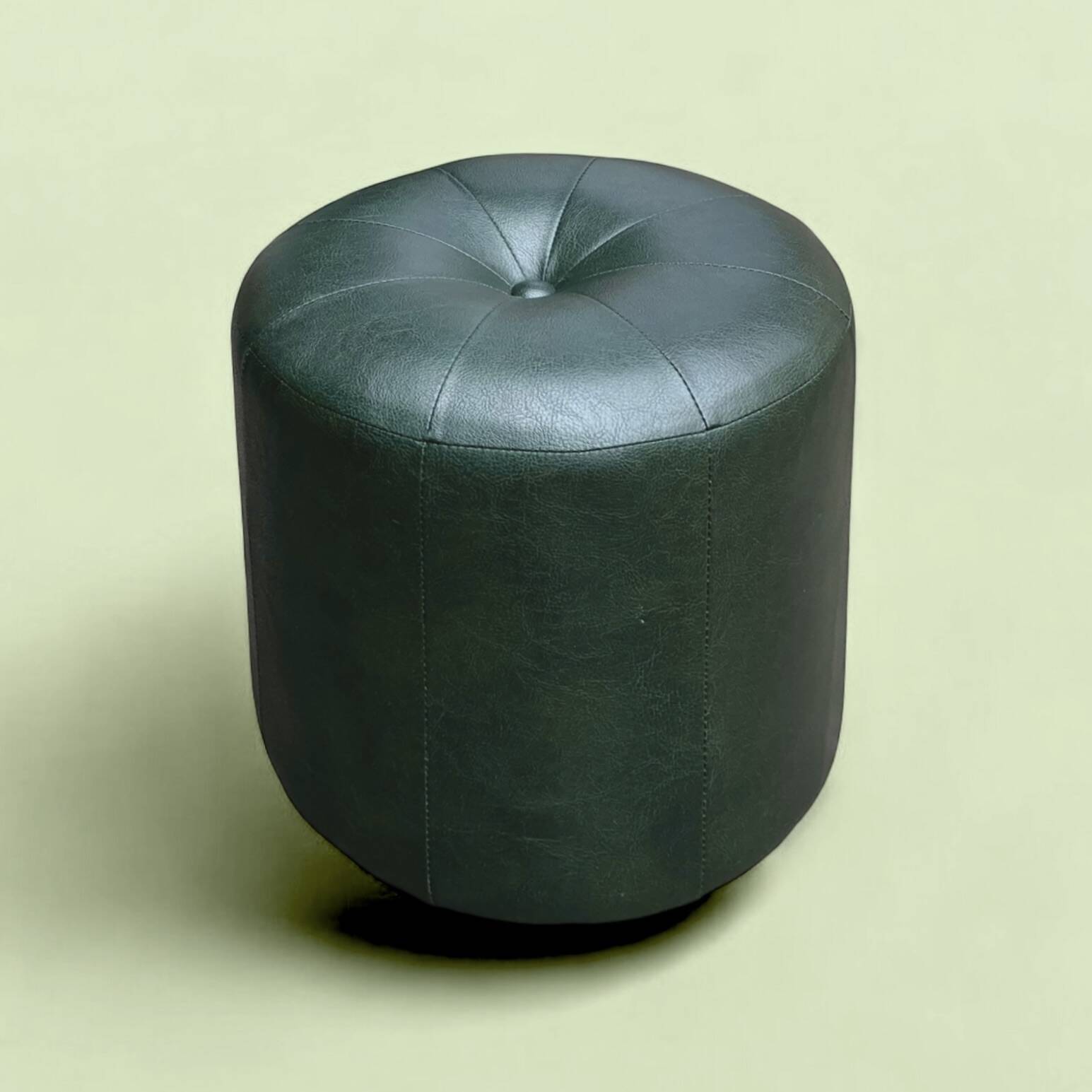 Pouf vintage rond en Skaï vert