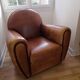 Tawny vintage leather club chair