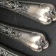 12 silver metal table knives model Rocaille