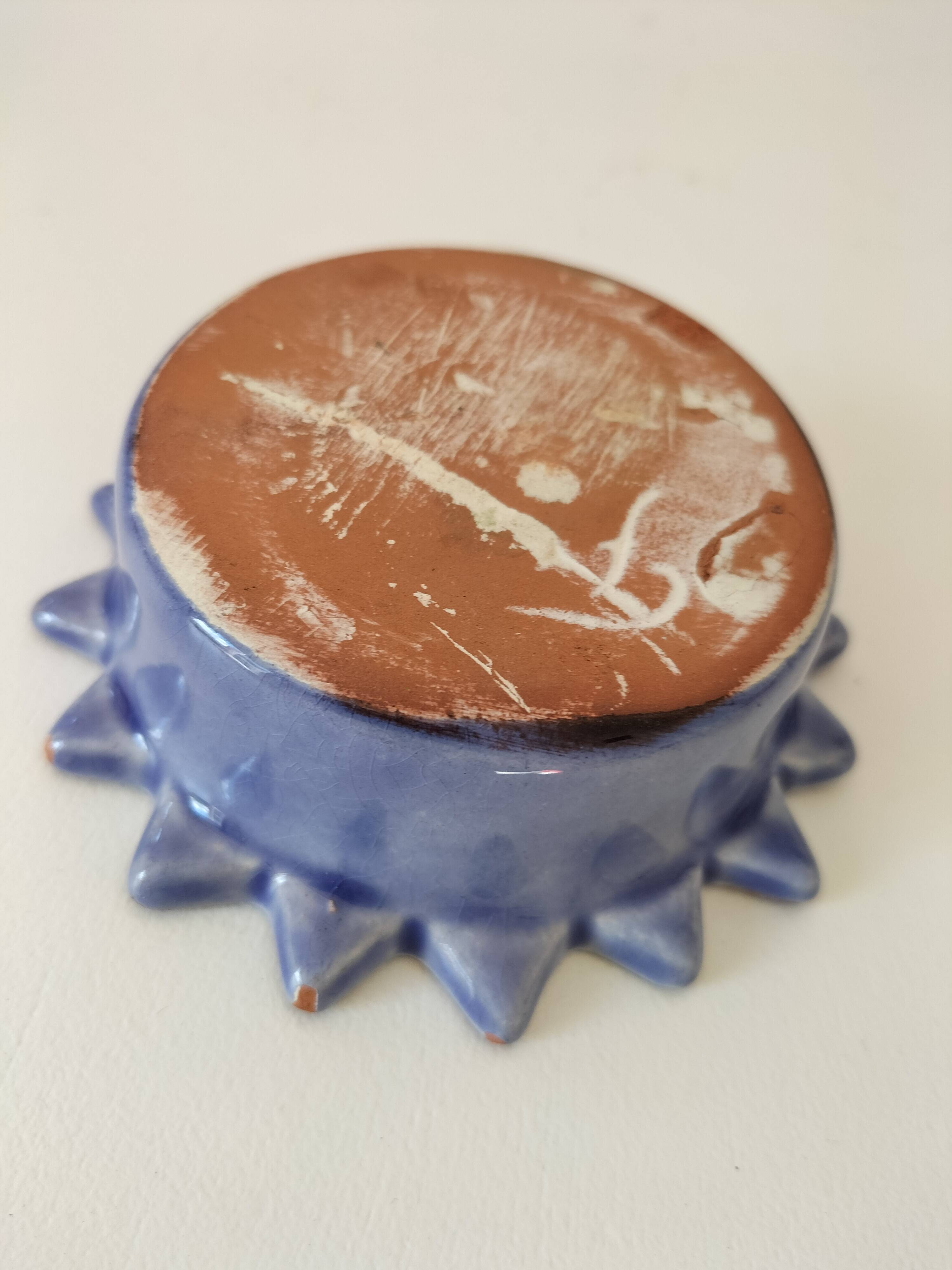 Handcrafted blue earthenware pocket emptier