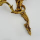 Paire d'appliques murales vintage à double feux en bronze ou laiton, feuille d'acanthes. Année 60