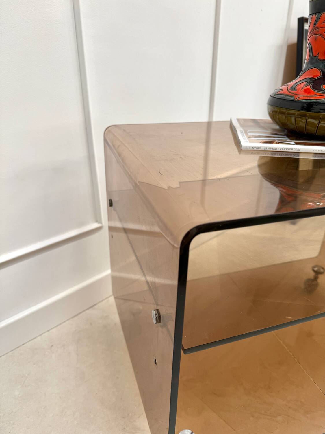 Smoked plexiglass coffee table