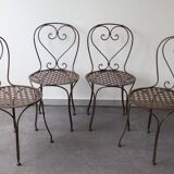 Set of 4 wrought iron chairs.