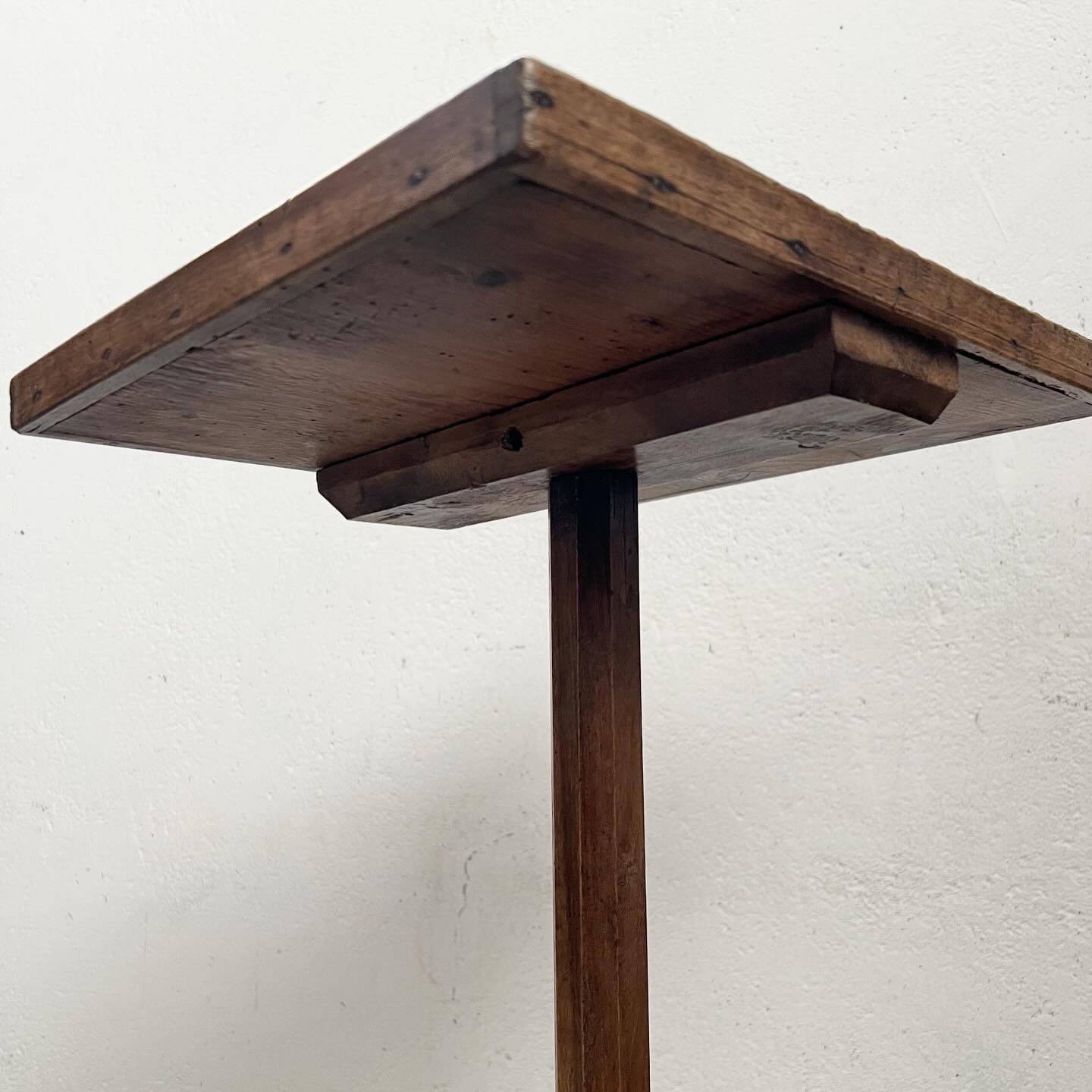 Old primitive wooden tripod pedestal table
