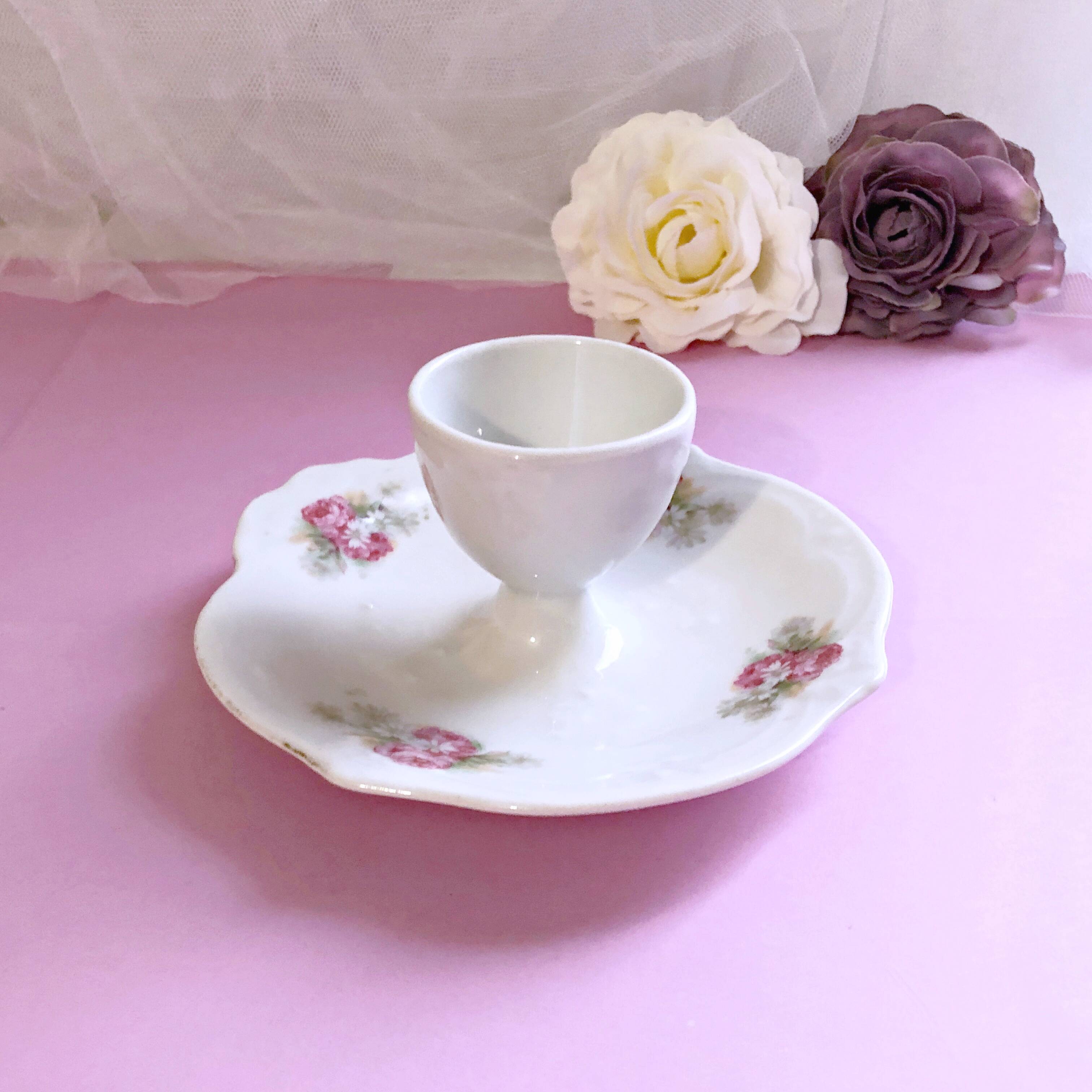 Porcelain egg cup with shabby chic style floral bouquet decoration Romanticism