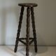 High tripod stool in turned wood