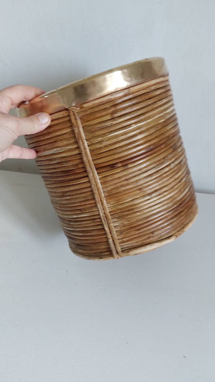 Rattan and brass pot cover