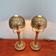 Pair of table lamps in bronze and brass, early 20th century.