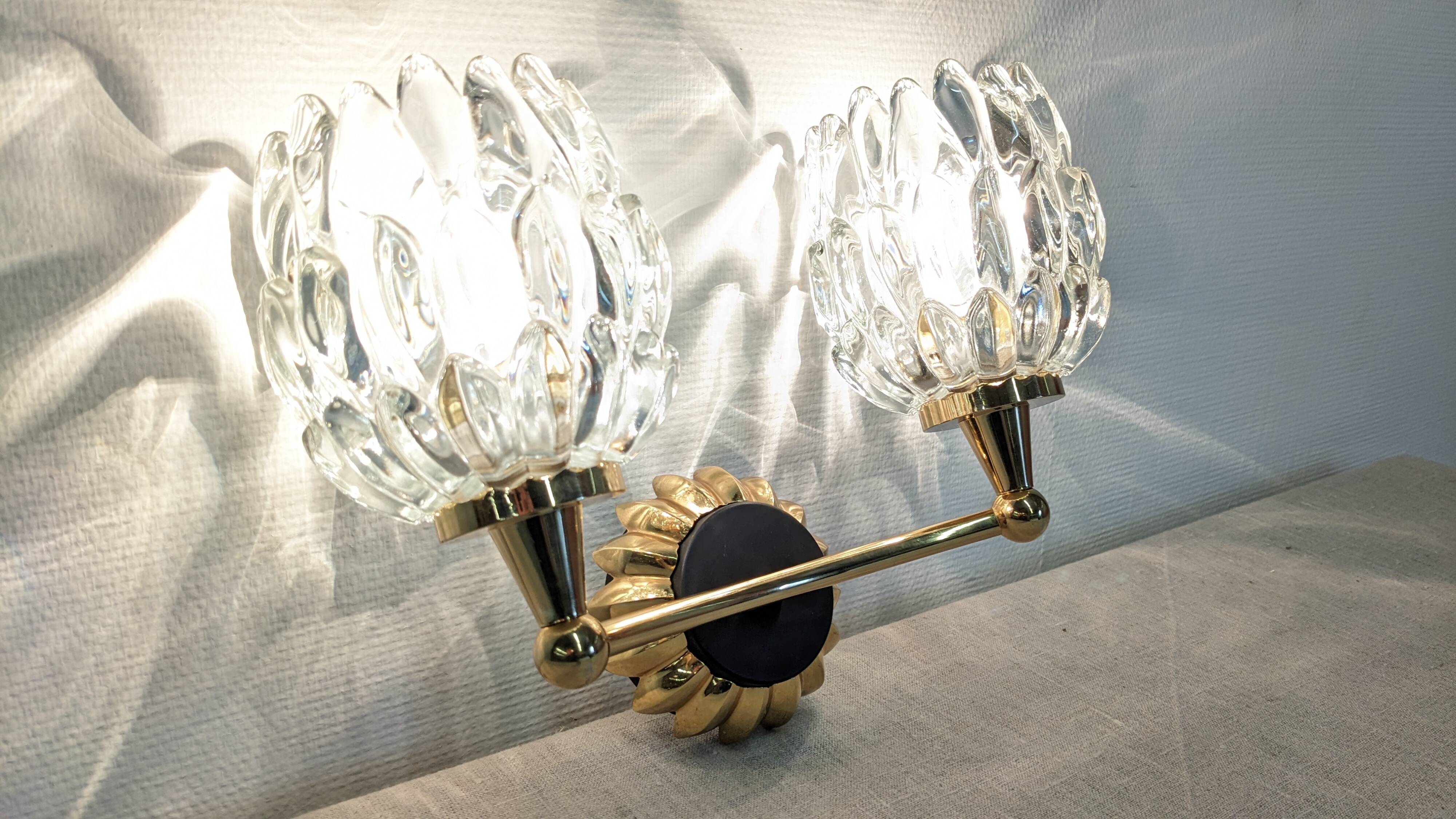 Set of 4 modernist double wall lights by Maison Arlus, France circa 1950.