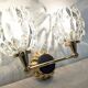 Set of 4 modernist double wall lights by Maison Arlus, France circa 1950.