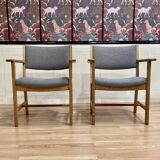 A pair of armchairs stamped "hans wegner" 1960.