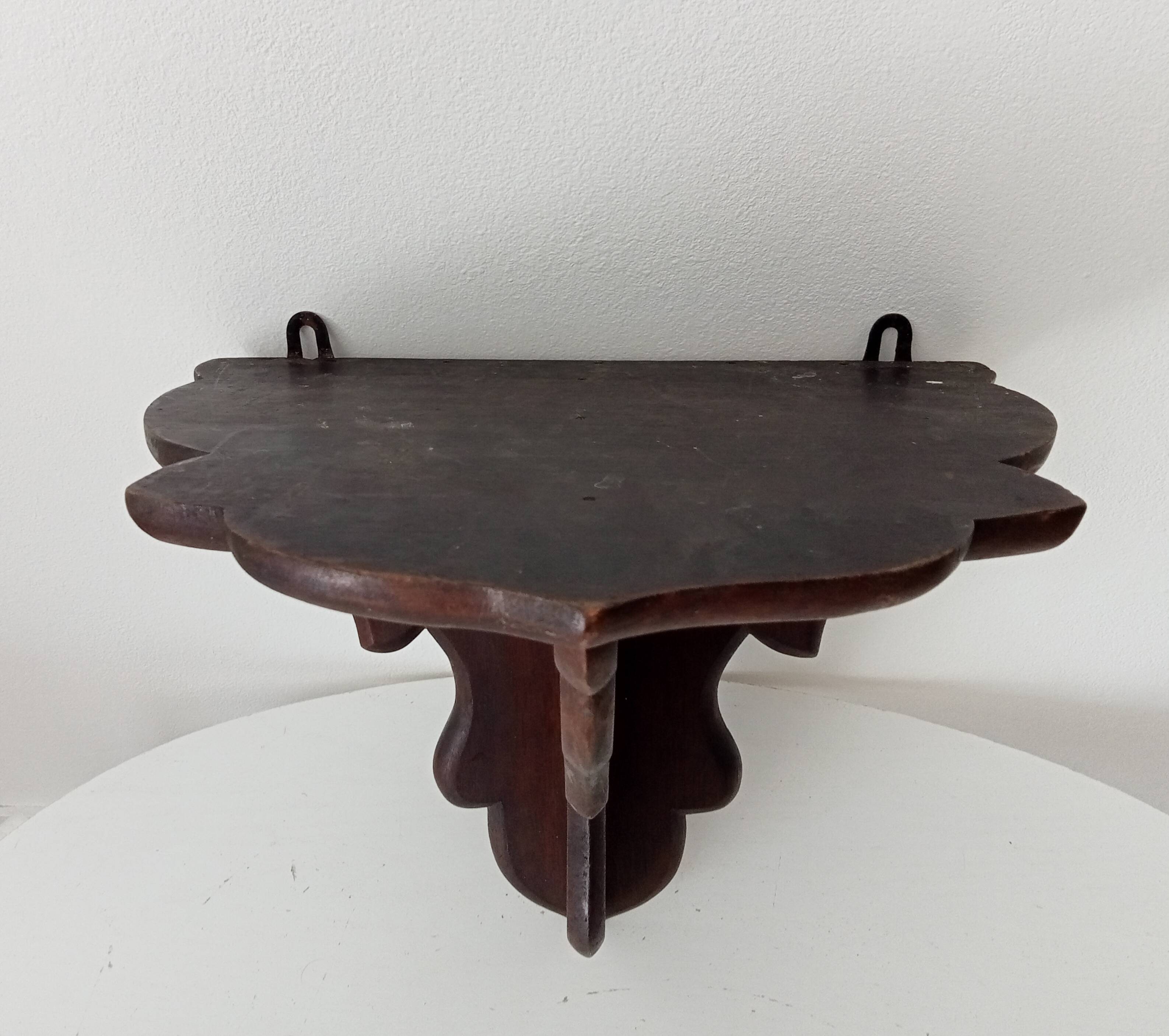 Pair of antique carved wooden shelves