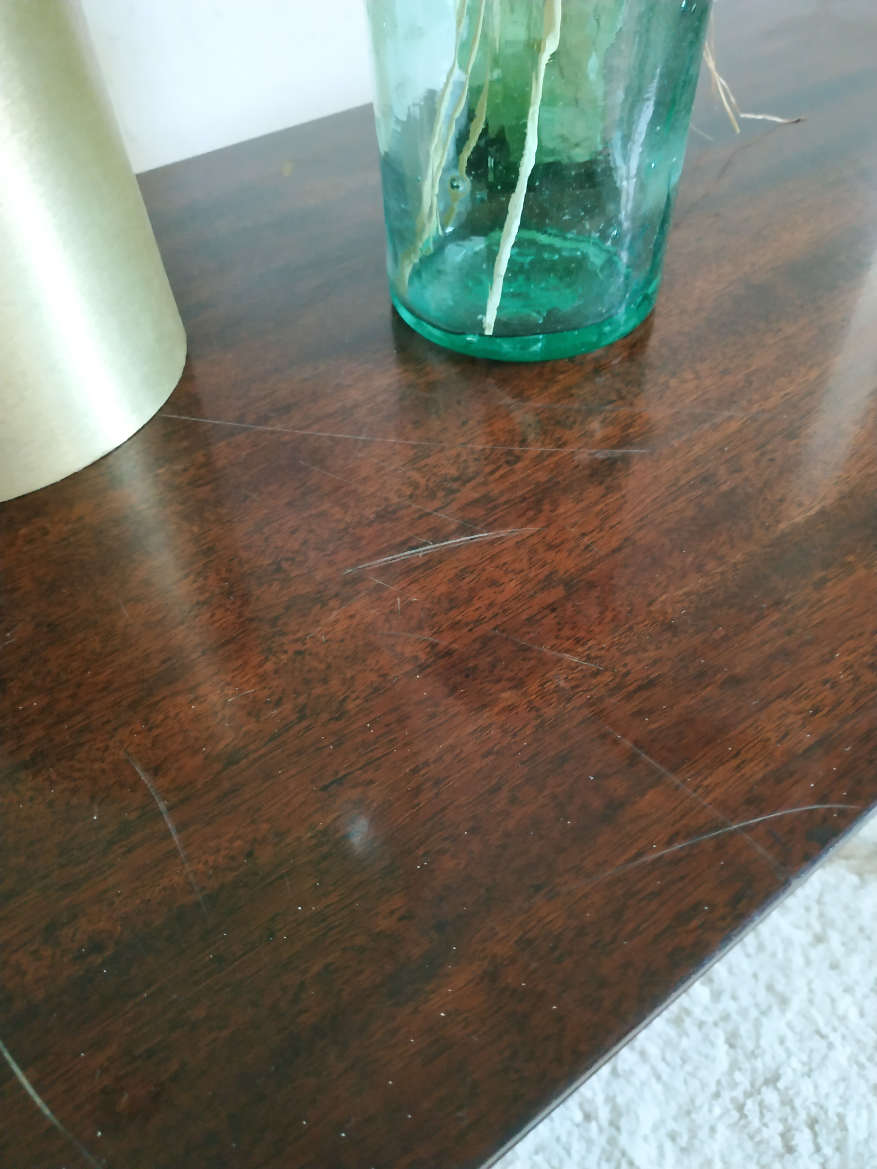 Dark wood console varnished compass feet