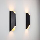 Architectural pair of vintage black metal wall lamps with angular geometric