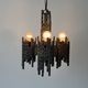 Three-armed suspended lamp in wrought iron, brutalist design, 1960s, Italy.