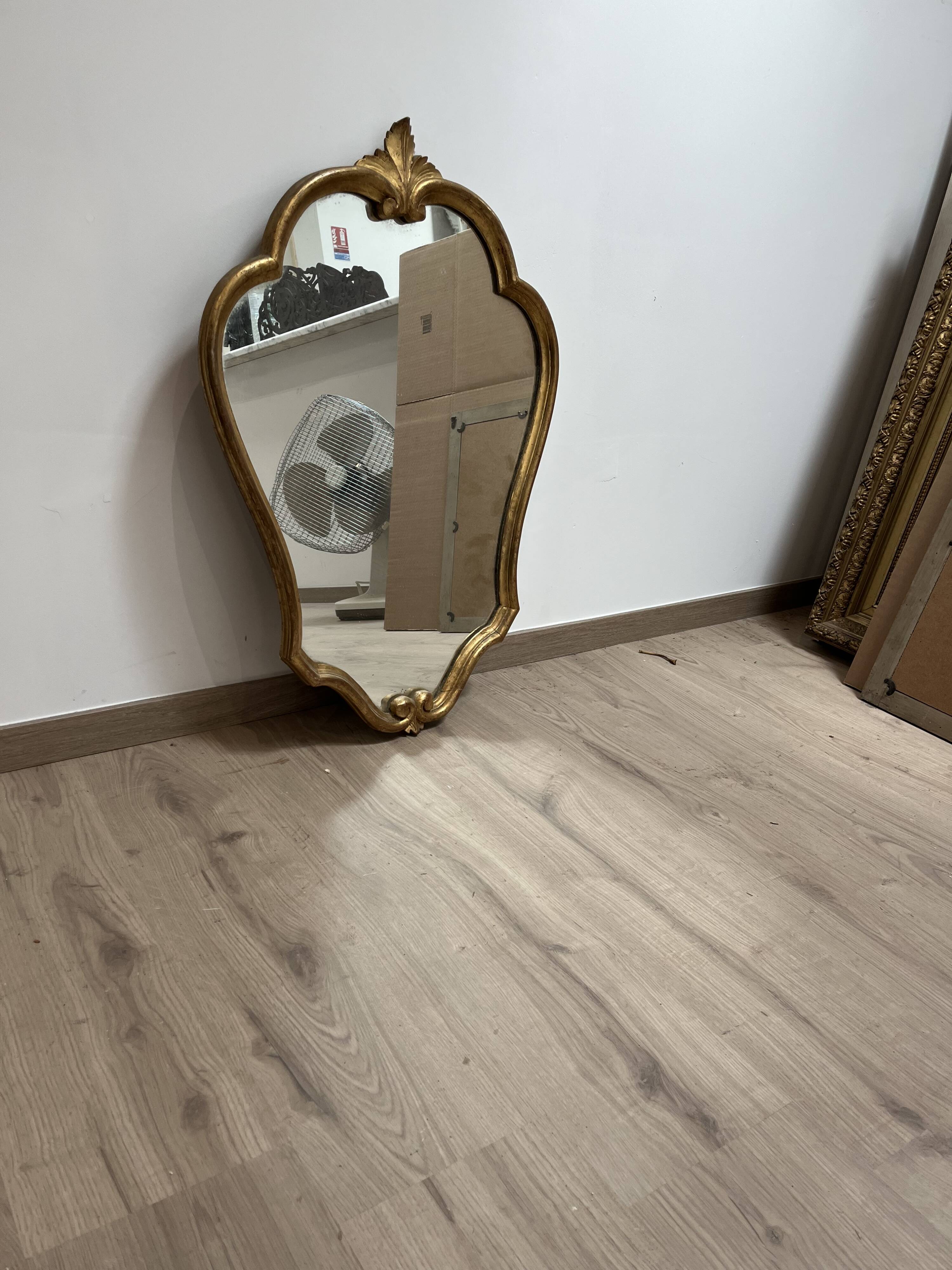 Mirror in wood and gilded stucco, 19th century
