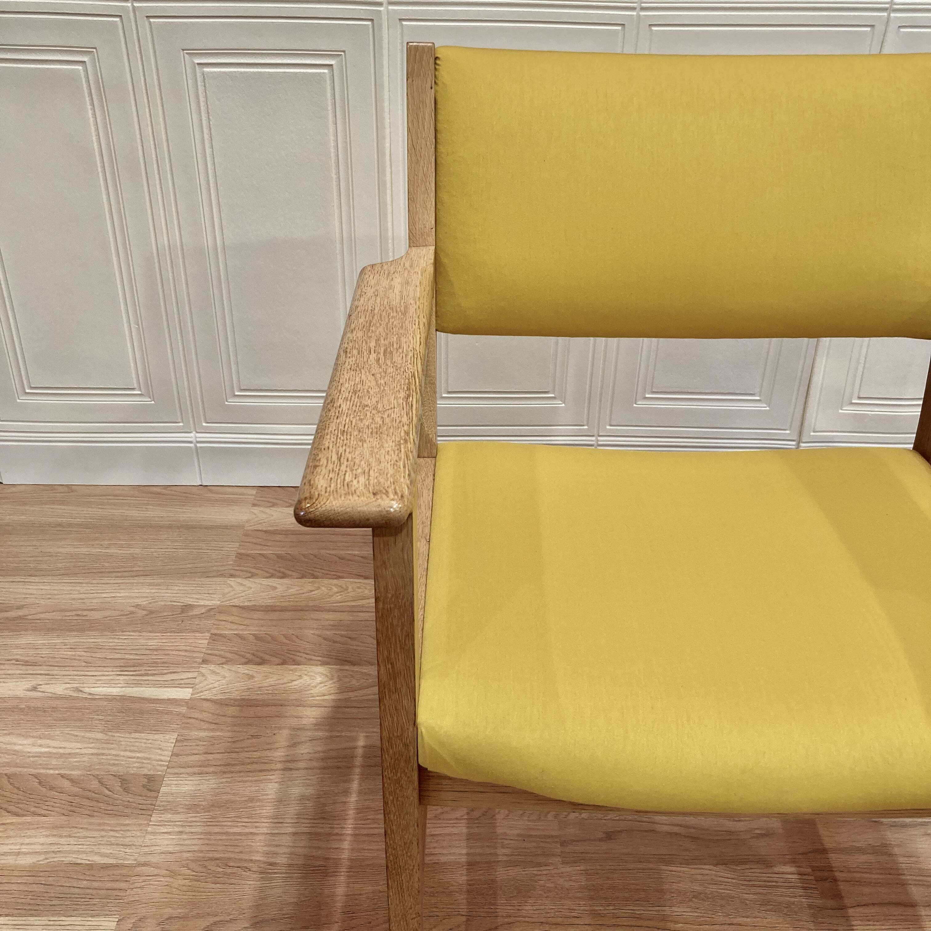 Set of 4 armchairs stamped Hans Wegner "Scandinavian design" 1960.