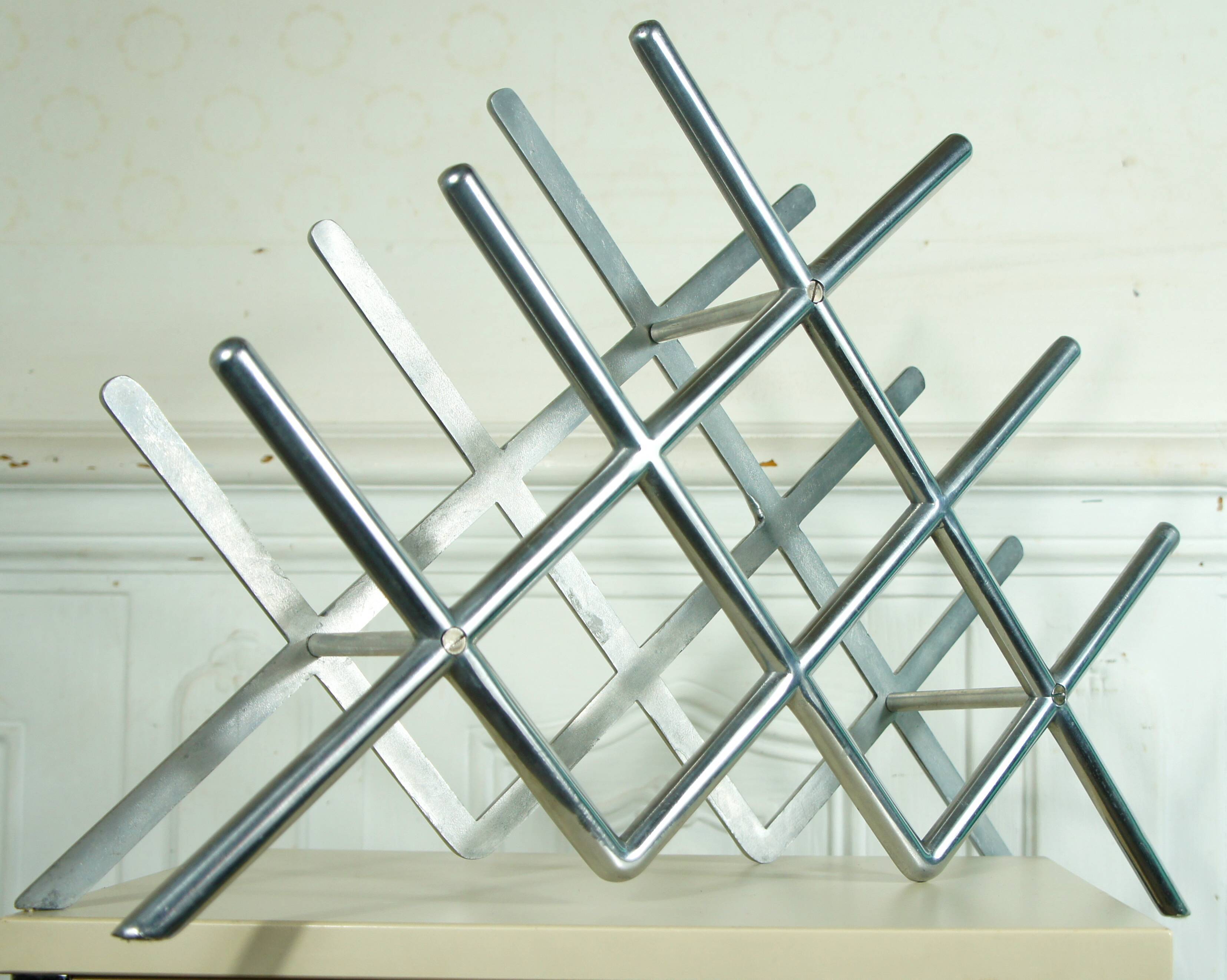 Modernist bottle holder cast aluminum, circa 1940