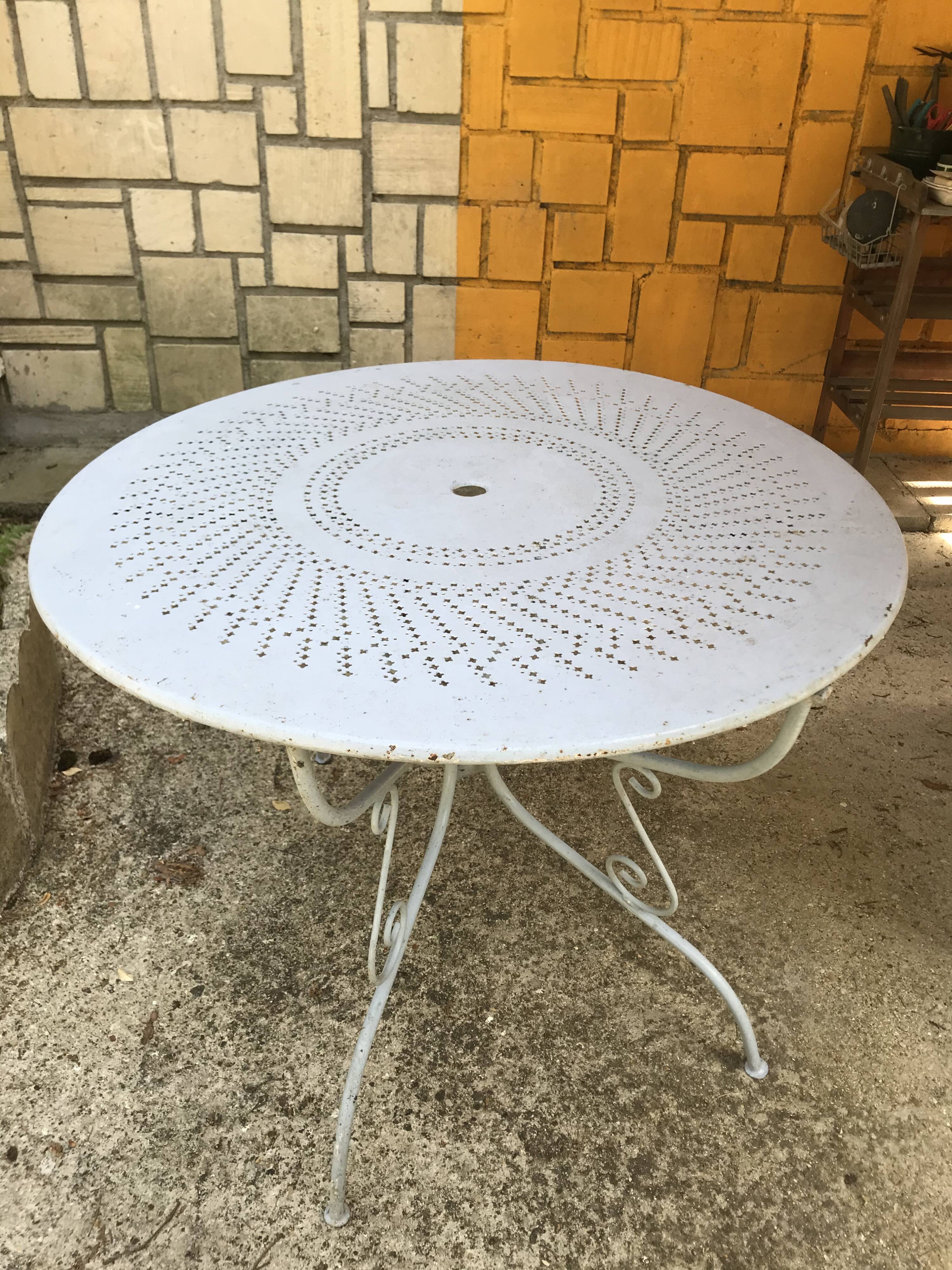 Old wrought iron garden table