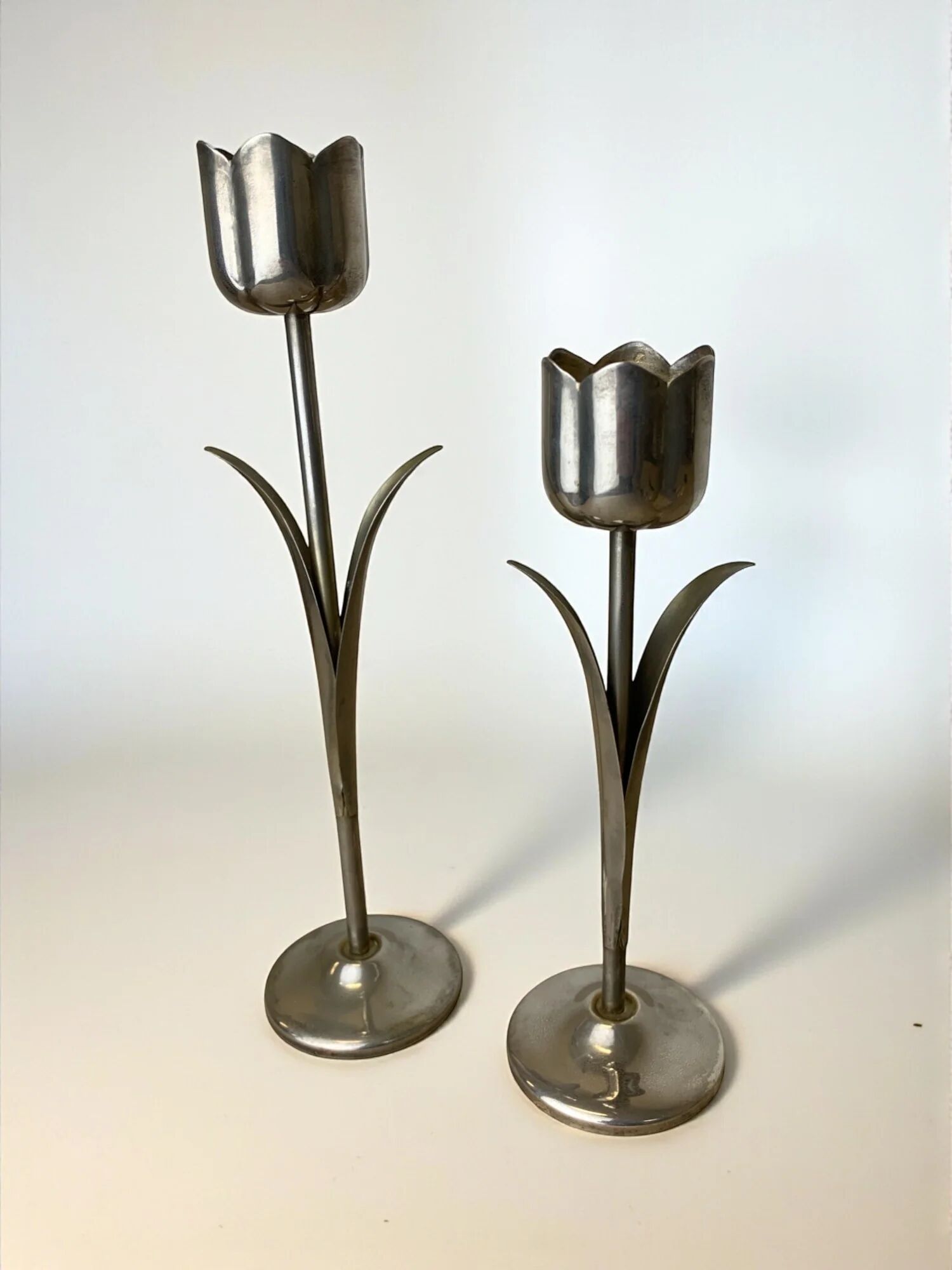 Pair of chromed tulip candle holders, 1970s, Italy